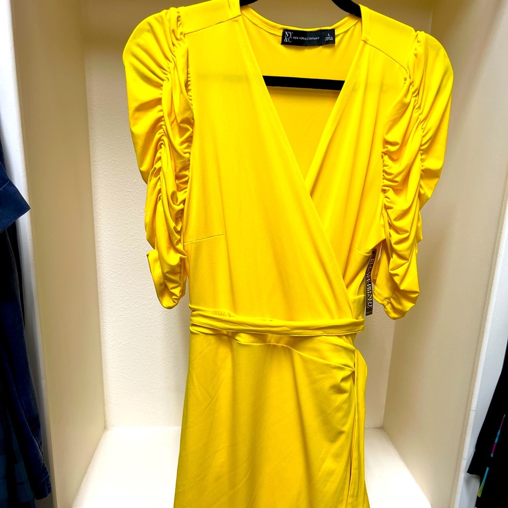 Bright yellow wrap dress with ruched sleeves